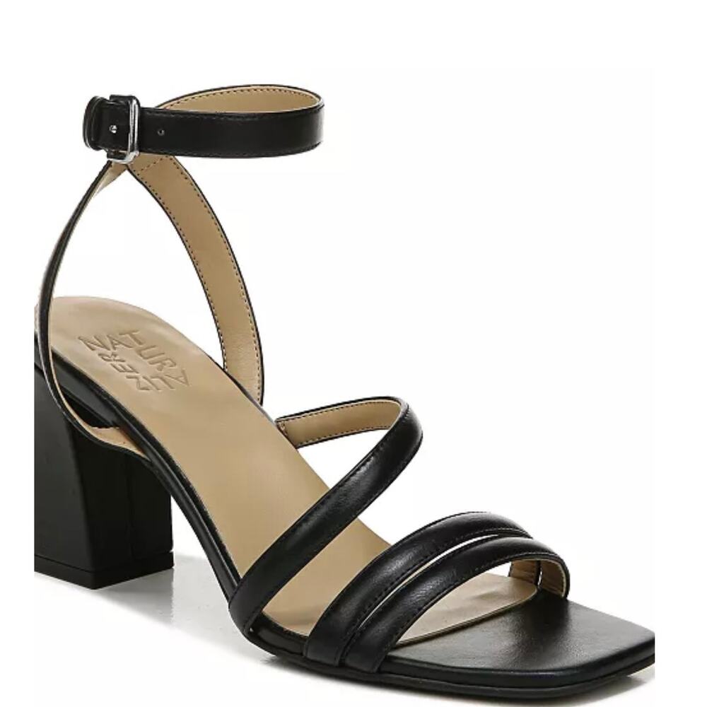 An asymmetrical strap and a block heel. Non-slip outsole.